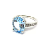 HG32.38 Oval Blue Topaz Cubic Zirconia Ring Sterling Silver